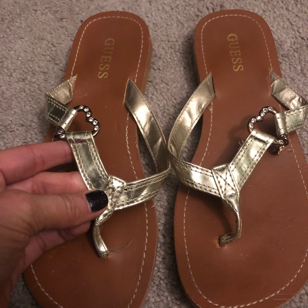 Guess women’s sandals size 7. Gold with 💎 detail